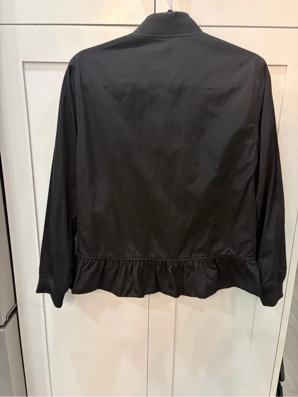 Kate Spade New York ruffled, hem, bomber jacket pink interior lining.